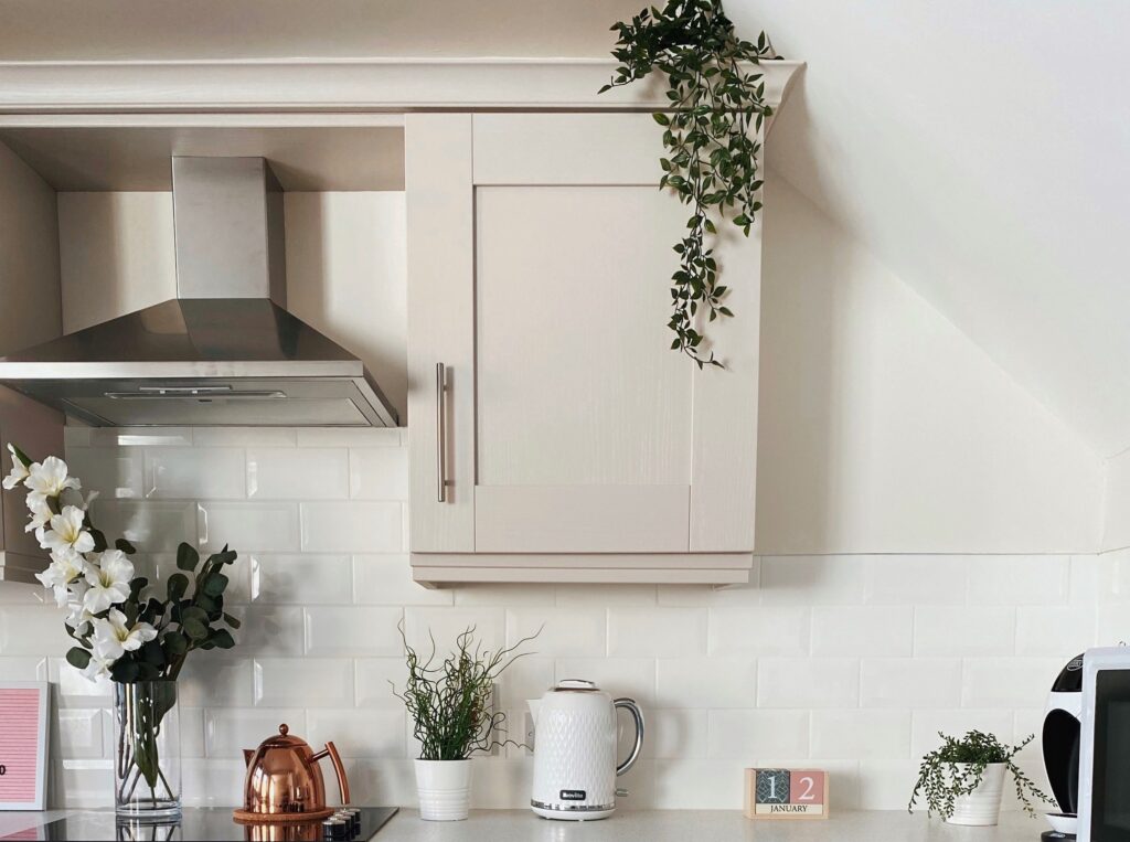 Is Greenery Above Kitchen Cabinets, Fake Greenery Above Kitchen Cabinets